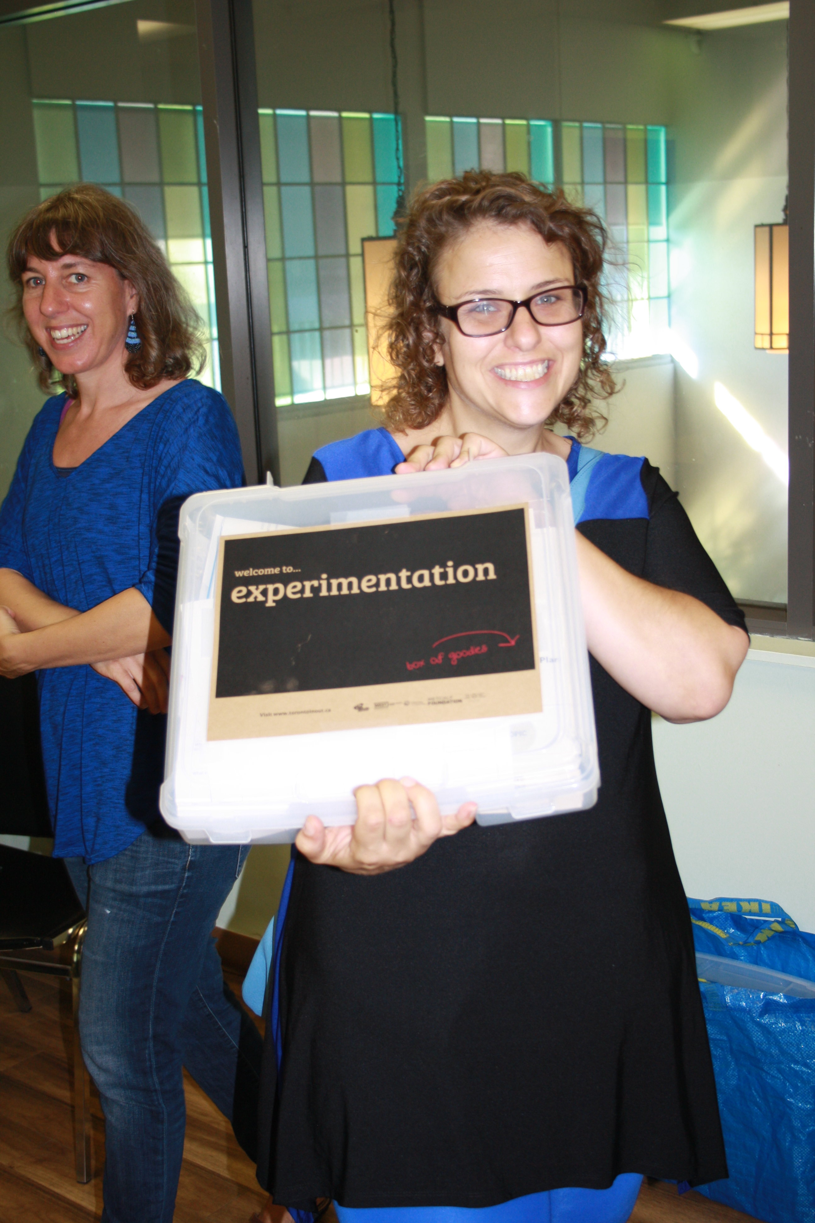 Alyssa showing off her Experimentation Box with copies of all the prototyped tools