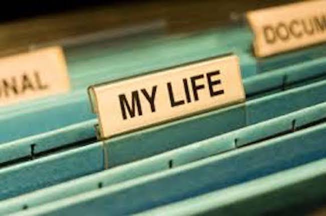 A photo of a file folder with a heading that reads "My Life"